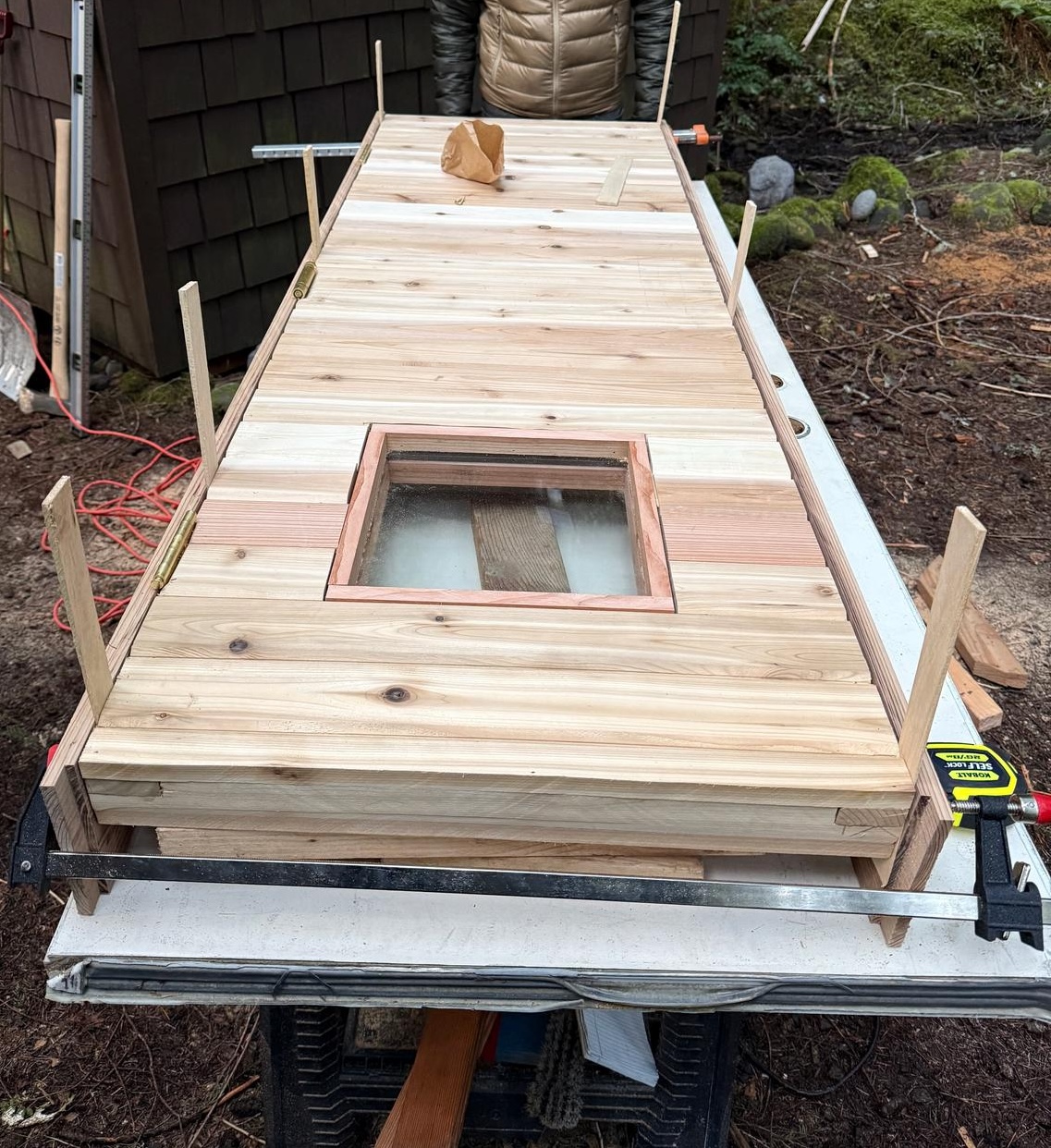 Door frame with shims lying on table
